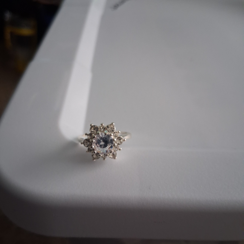 Elegant Silver Tone Ring with Clear Gemstone